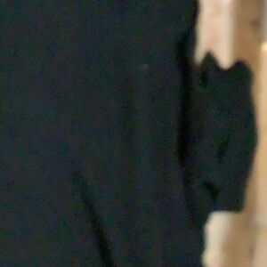 Paige black turtle neck sweater with cut out sleeve